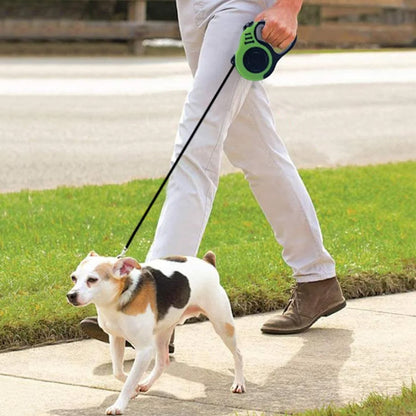 Laisse pour chien enrouleur avec chien et femme a la marche